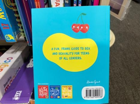 The back cover of "Welcome to Sex," by Dr Melissa Kang and Yumi Stynes, is aimed at children aged 10 to 15 and features detailed illustrations and instructions on how to engage in sexual intercourse, as well as information on male and female genitalia and gender identity issues in Sydney, Australia on July 19, 2023. (M. Sun/The Epoch Times)