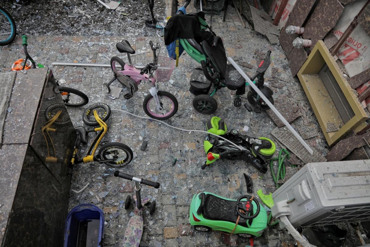 Children's bicycles among debris in an apartment building damaged during Russian missile and drone strikes, amid Russia's attack on Ukraine, near Odesa, Ukraine, on July 19, 2023. (Stringer/Reuters)