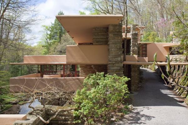 To marry the landscape with the architecture, Wright specified natural materials for Fallingwater’s construction. As seen in the eastern elevation, these materials included native stacked stone for various piers, walls, walkways, and the centerpiece chimney. The architectural design intends to hug the surrounding forest. (Christopher Little/Courtesy of the Western Pennsylvania Conservancy)