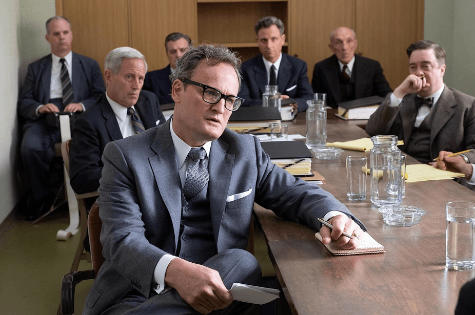 Special counsel Roger Robb (Jason Clarke, front C) grills J.R. Oppenheimer (Cillian Murphy, off-screen) about his communist leanings, in "Oppenheimer." (Universal Pictures)