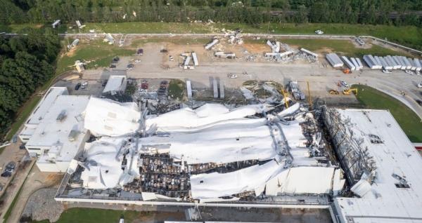 Debris is scattered around the Pfizer facility in Rocky Mount, N.C., after damage from severe weather, on July 19, 2023. (Travis Long/The News & Observer via AP)