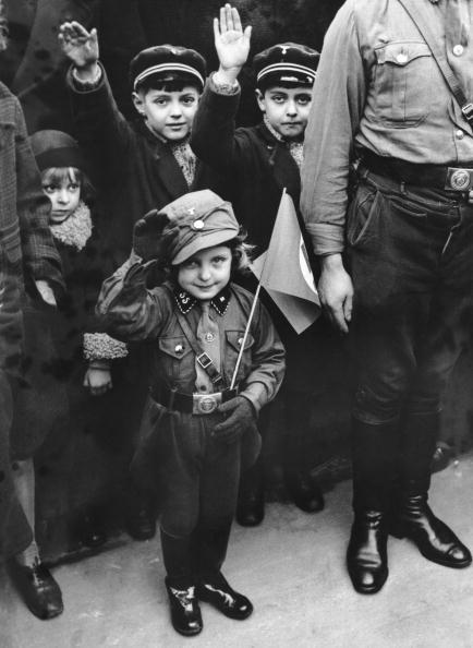 In Berlin on March 8, 1933, children are given a day off school to celebrate the success of the Nazi Party. (FPG/Hulton Archive/Getty Images)