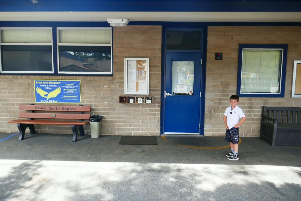 H.N. in front of the principal<span style="font-weight: 400;">’</span>s office at Brook Knoll Elementary School in Scotts Valley, Calif., on July 16, 2023. (Steve Ispas/The Epoch Times)