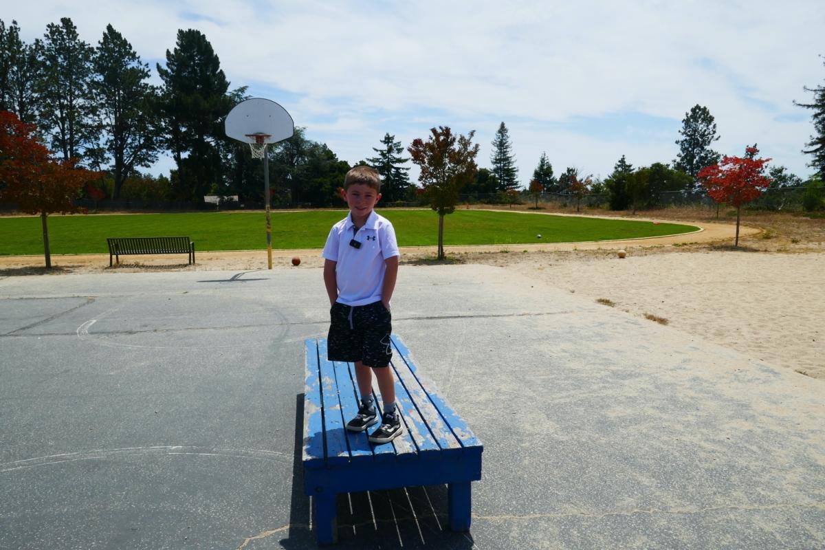 "HN" in front of the track field at Brook Knoll Elementary in Scotts Valley, Calif. on July 16, 2023 (Steve Ispas/The Epoch Times)