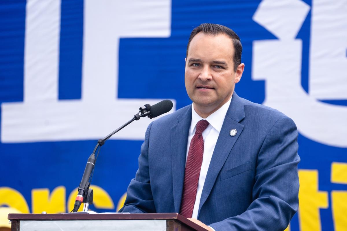 Andrew Bremberg, president and CEO of the Victims of Communism Memorial Foundation, speaks during a Falun Gong rally marking the 24th anniversary of the persecution of the spiritual discipline in China by the Chinese Communist Party, at the National Mall in Washington on July 20, 2023. (Samira Bouaou/The Epoch Times)