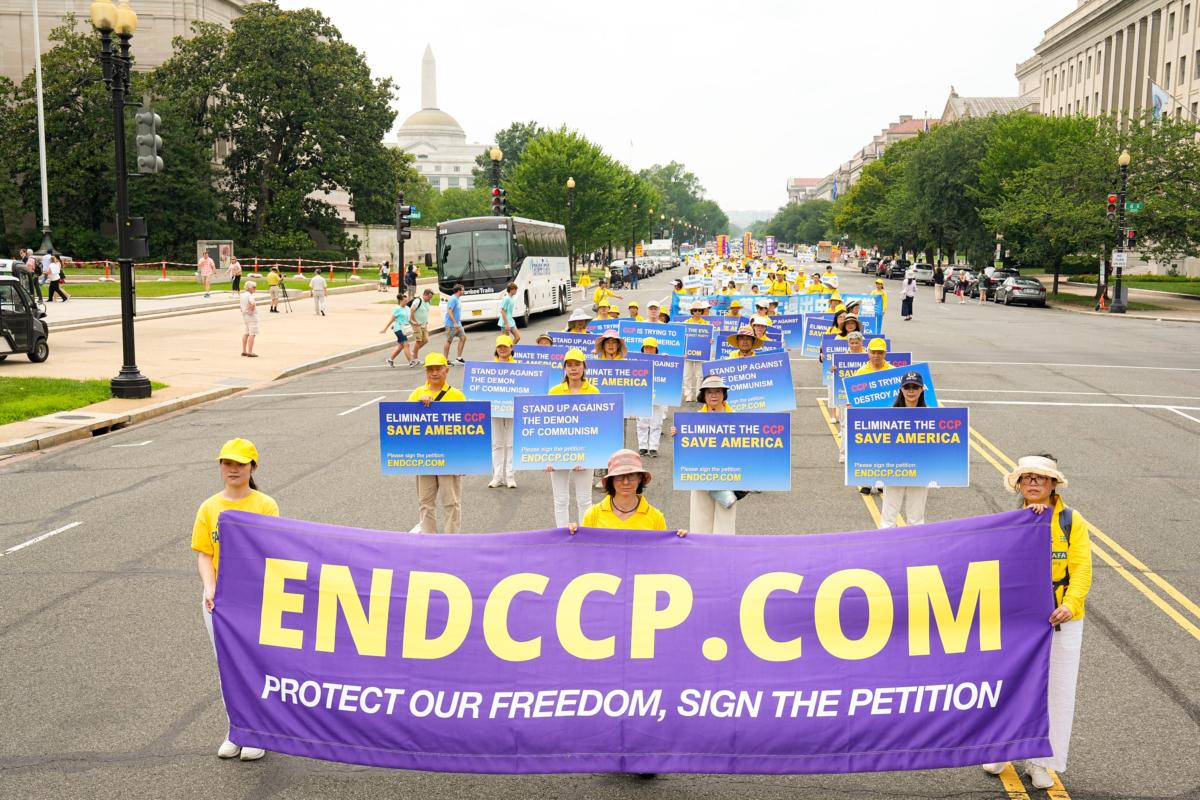 Falun Gong adherents march to mark the 24th anniversary of the Chinese regime's persecution of the spiritual discipline, in Washington on July 20, 2023. (Larry Dye/The Epoch Times)