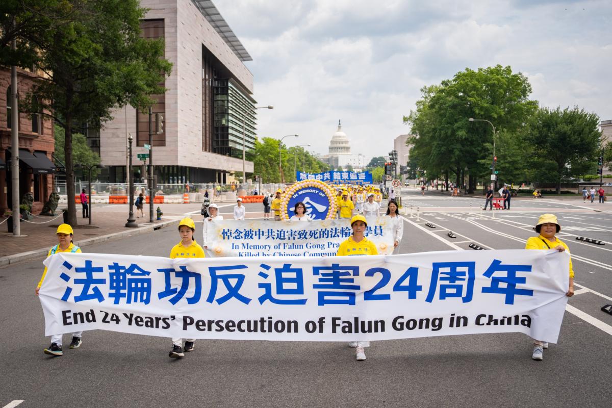 Falun Gong adherents march to mark the 24th anniversary of the Chinese regime's persecution of the spiritual discipline, in Washington on July 20, 2023. (Samira Bouaou/The Epoch Times)