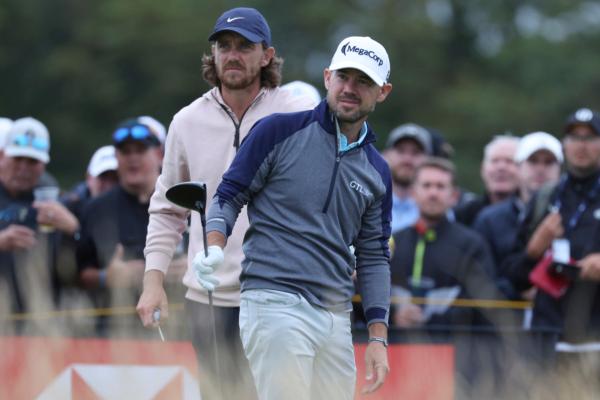 United States' Brian Harman, right and England's Tommy Fleetwood look down the 14th hole from the tee during the third day of the British Open Golf Championships at the Royal Liverpool Golf Club in Hoylake, England on July 22, 2023. (Peter Morrison/AP Photo)