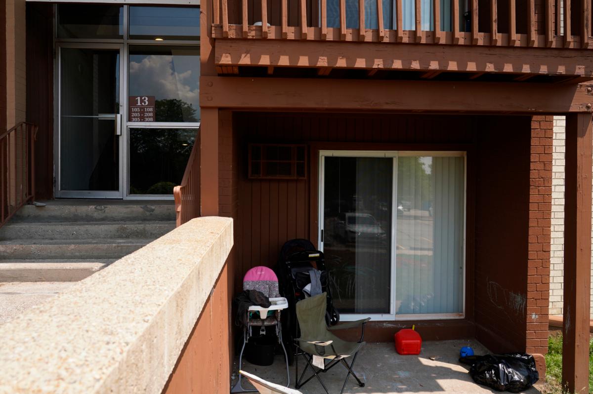 Children's equipment sits outside of an apartment on July 5, 2023, in Lansing, Mich., where Rashad Trice, 26, is accused of kidnapping Wynter Cole Smith, 2, after stabbing and assaulting her mother. (Ryan Garza/Detroit Free Press via AP)