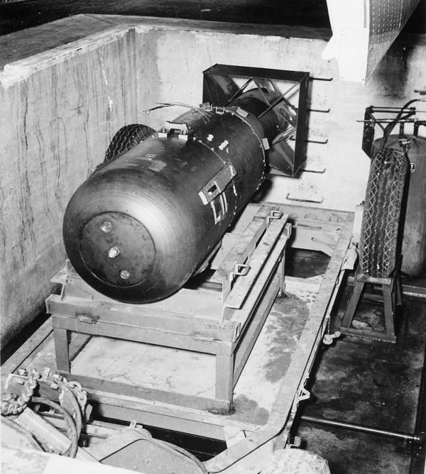 "Little Boy" unit on trailer cradle in pit on Tinian, before loading into Enola Gay's bomb bay, Aug. 1, 1945. (Public Domain)