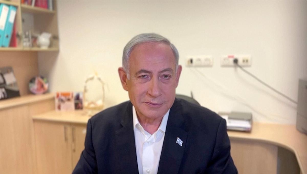 Israeli Prime Minister Benjamin Netanyahu speaks from the Sheba Medical Centre in Ramat Gan, Israel, on July 23, 2023, in a still from video. (GPO via Reuters/Screenshot via The Epoch Times)