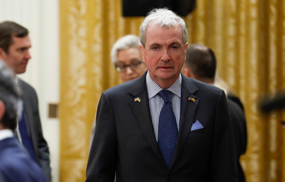 New Jersey Governor Phil Murphy walks to his seat before the start of a meeting between U.S. President Joe Biden and governors in the East Room of the White House on Feb. 10, 2023. (Anna Moneymaker/Getty Images)