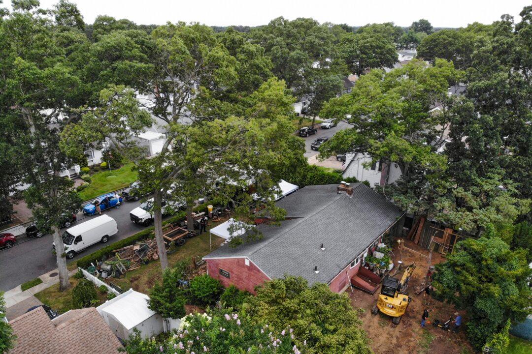 Excavator Seen Digging in Backyard of Man Charged in Gilgo Beach Killings
