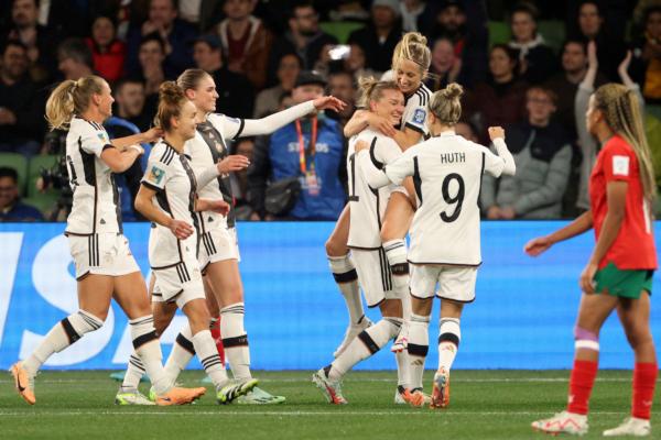 Germany players celebrate after Germany's Alexandra Popp, 4th right, scored the opening goal during the Women's World Cup Group H soccer match between Germany and Morocco in Melbourne, Australia on July 24, 2023. (Hamish Blair/AP Photo)