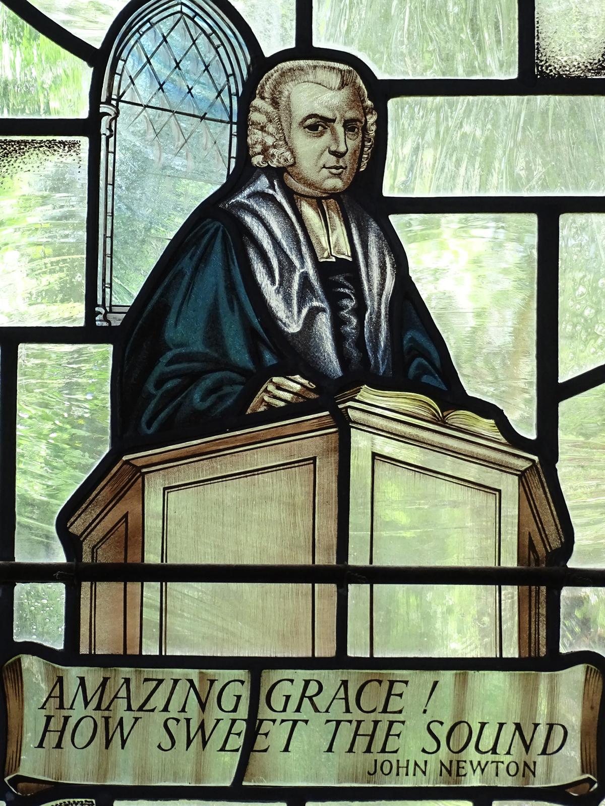 Stained glass window with John Newton, writer of "Amazing Grace," in St. Peter and Paul Church, Buckinghamshire, England. (Adam Jones/<a href="https://creativecommons.org/licenses/by-sa/2.0/deed.en">CC BY-SA 2.0</a>)