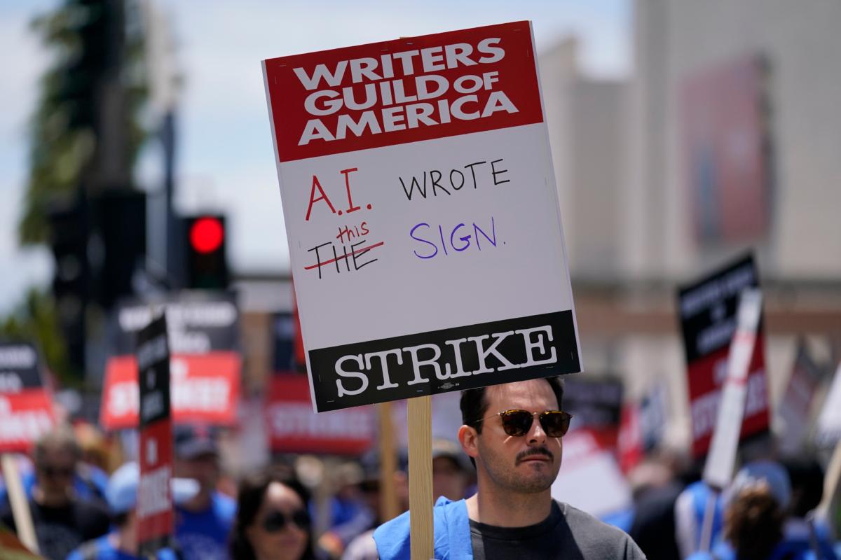  Members of the Writers Guild of America picket outside Fox Studios in Los Angeles on May 2, 2023. (Ashley Landis/AP Photo)