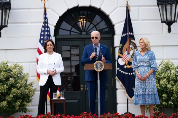 (L-R) Vice President Kamala Harris, President Joe Biden, and First Lady Jill Biden speak during a congressional picnic at the South Lawn of the White House in Washington, on July 19, 2023. (Madalina Vasiliu/The Epoch Times)