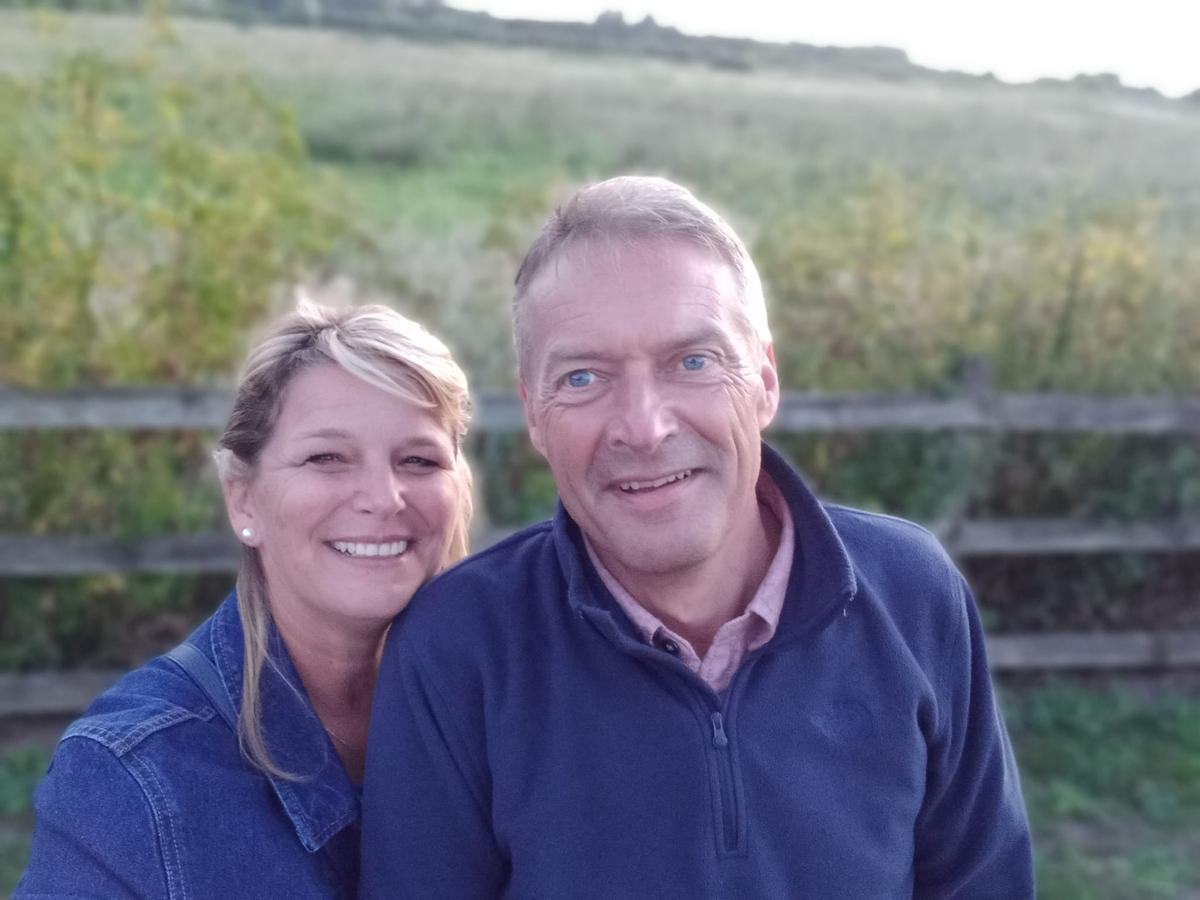 Emma Ruscoe, 55, with her husband, Simon, 58. (SWNS)