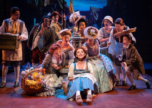 Audrey Hare (C) surrounded by the cast ensemble in Disney’s “Beauty and the Beast.” (Liz Lauren)