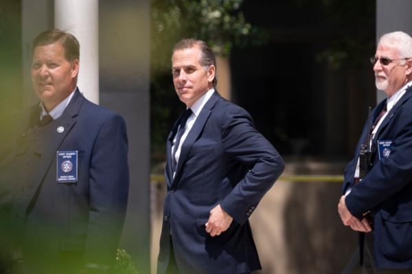 Hunter Biden (C.) leaves the J. Caleb Boggs Federal Building in Wilmington, Del., on July 26, 2023. (Madalina Vasiliu/The Epoch Times)