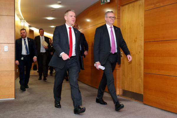 New Zealand Prime Minister Chris Hipkins (L) and Australian and Prime Minister Anthony Albanese arrive during a press conference at Parliament in Wellington, New Zealand, on July 26, 2023. (Hagen Hopkins/Getty Images)