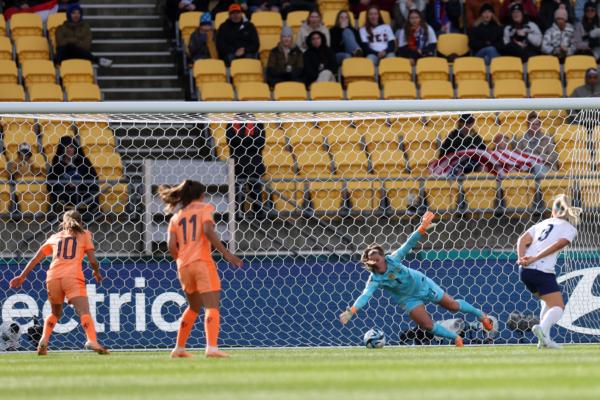 Alyssa Naeher of USA dives in vain as Jill Roord of Netherlands (not pictured) scores her team's first goal during the FIFA Women's World Cup Australia & New Zealand 2023 Group E match between USA and Netherlands at Wellington Regional Stadium in Wellington, New Zealand, on July 27, 2023 . (Catherine Ivill/Getty Images)
