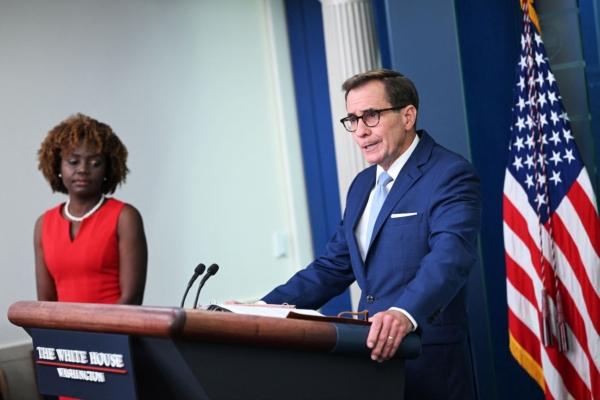White House Press Secretary Karine Jean-Pierre (L) looks on as National Security Council Coordinator for Strategic Communications John Kirby speaks during the daily briefing in the Brady Press Briefing Room of the White House in Washington, on July 26, 2023. (Mandel Ngan/AFP via Getty Images)