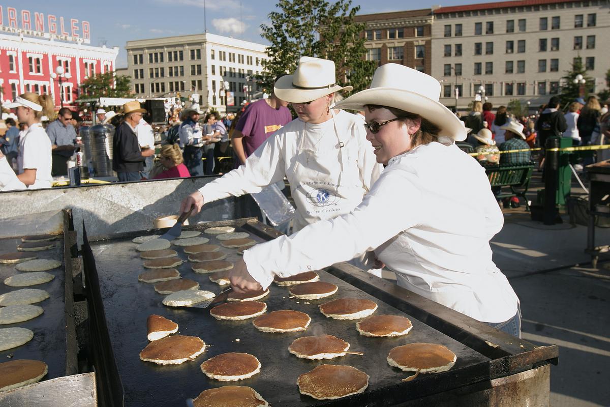Pancake flippers at the pancake breakfast in Cheyenne, Wyoming. (Courtesy of Visit Cheyenne)