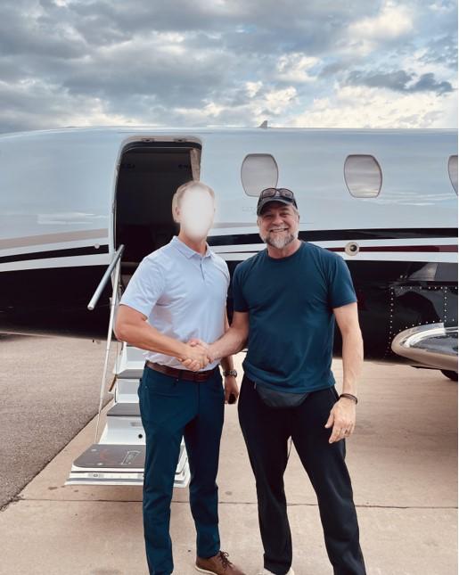 Victor Marx (R) poses for a photo with the Blue Angels pilot who assisted in the rescue of a teenage sex trafficking victim on July 25, 2023. (Courtesy of Victor Marx)