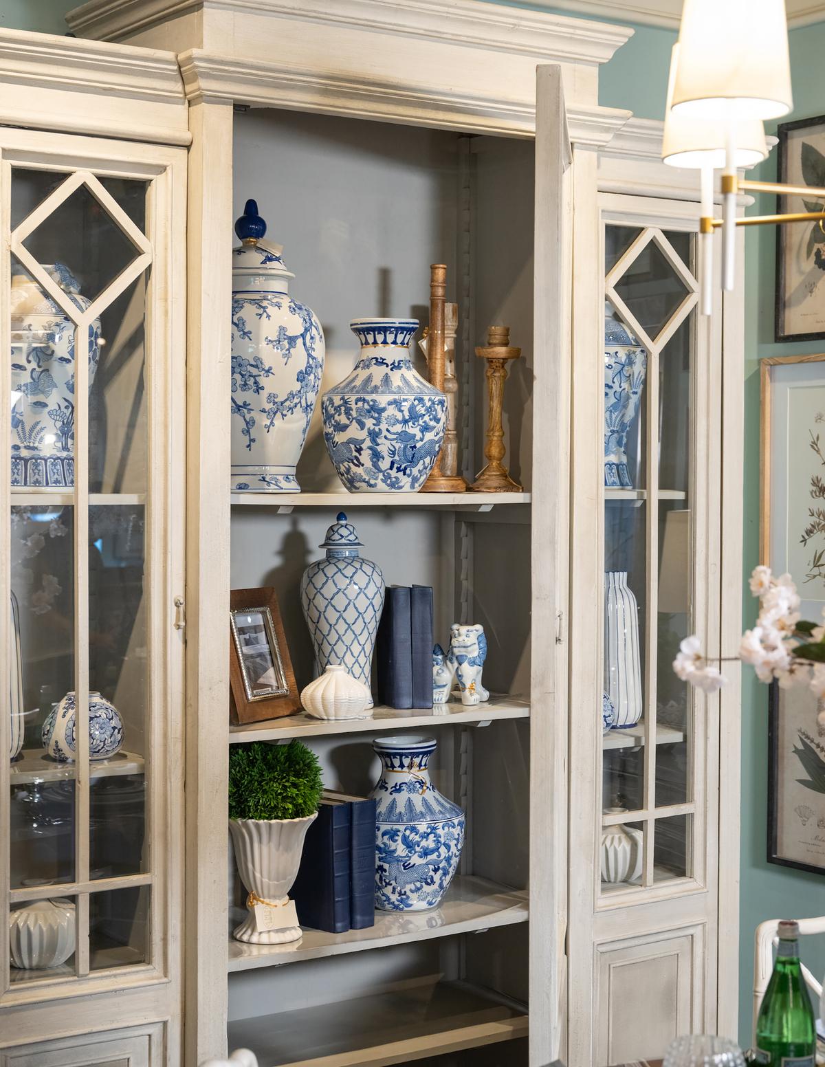 An etagere designed to exude a formal aesthetic, boasting glass shelves and brass finishings, complemented by an acrylic bar handle. (Handout/TNS)