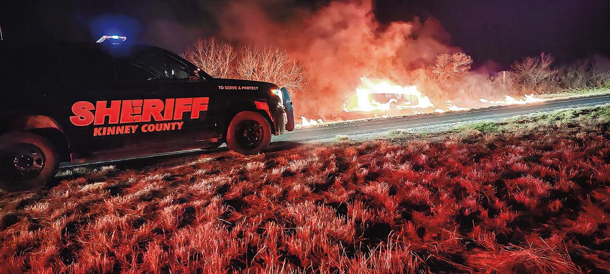 Law enforcement responds to a crash and fire of a suspected smuggling vehicle near Brackettville, Texas. (Courtesy of Kinney County Sheriff's Office)