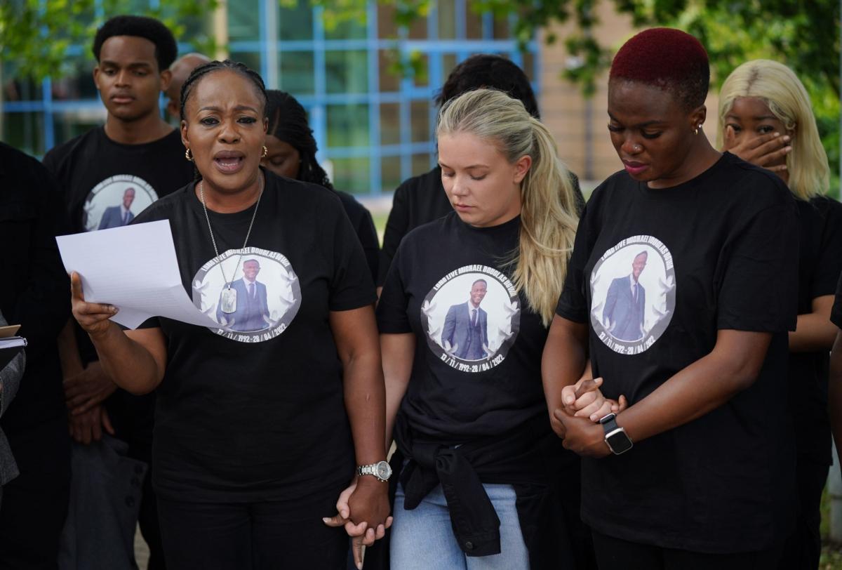 Michael Ugwa's mother Lauretta (L) makes a statement outside Basildon Combined Court, Essex, England, on July 28, 2023. (Yui Mok/PA)