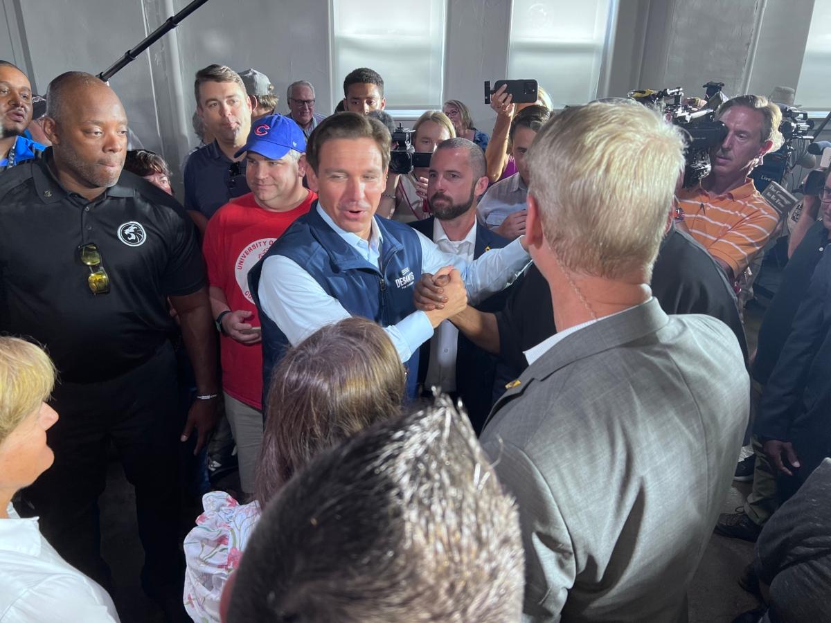 Florida governor Ron DeSantis greets supporters at a campaign stop in Chariton, Iowa, on July 27, 2023 (Lawrence Wilson / The Epoch Times0