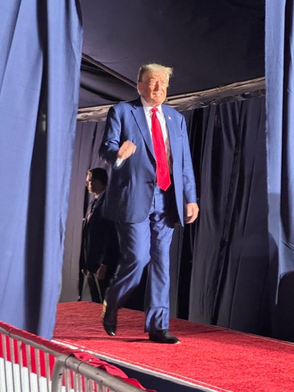Former president Donald Trump enters Erie Insurance Arena in Erie, Pa., for a presidential campaign rally on July 29, 2023. (Courtesy of Michael Hisle)