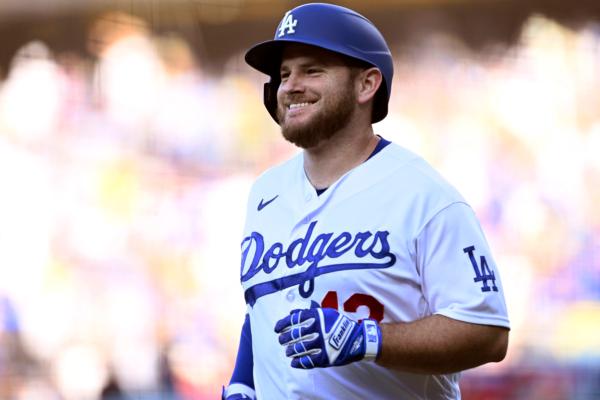 Los Angeles Dodgers' Max Muncy smiles after hitting a two-run home run against the Cincinnati Reds during the first inning of a baseball game in Los Angeles on July 29, 2023. (Alex Gallardo/AP Photo)