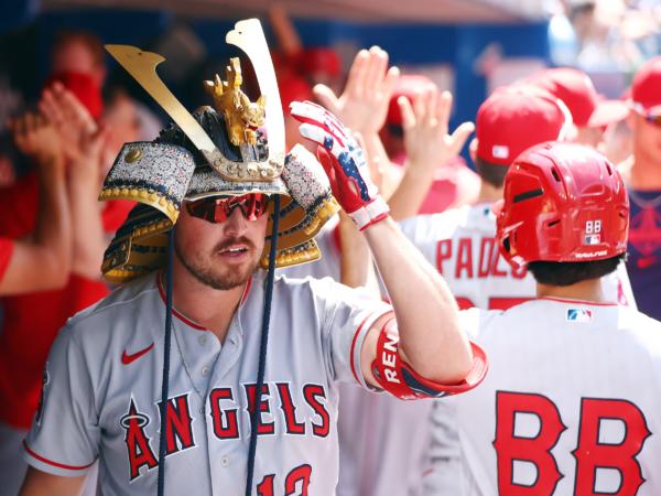 Hunter Renfroe (12) of the Los Angeles Angels celebrates after hitting a two-run home run in the tenth inning against the Toronto Blue Jays at Rogers Centre in Toronto, Ontario, Canada, on July 30, 2023. (Vaughn Ridley/Getty Images)