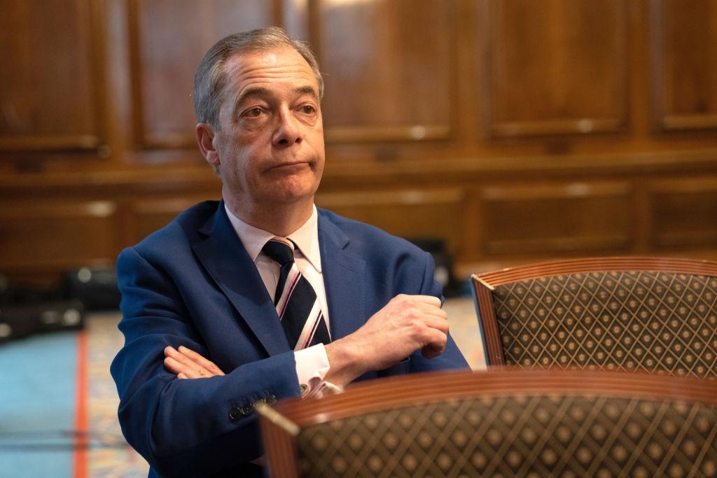 Reform UK honorary president Nigel Farage listens during a party press conference in England on March 20, 2023. (Carl Court/Getty Images)