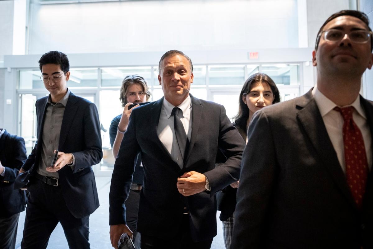 At center, Devon Archer, a former business associate of Hunter Biden, arrives for closed-door testimony with the House Oversight Committee in Washington on July 31, 2023. (Drew Angerer/Getty Images)