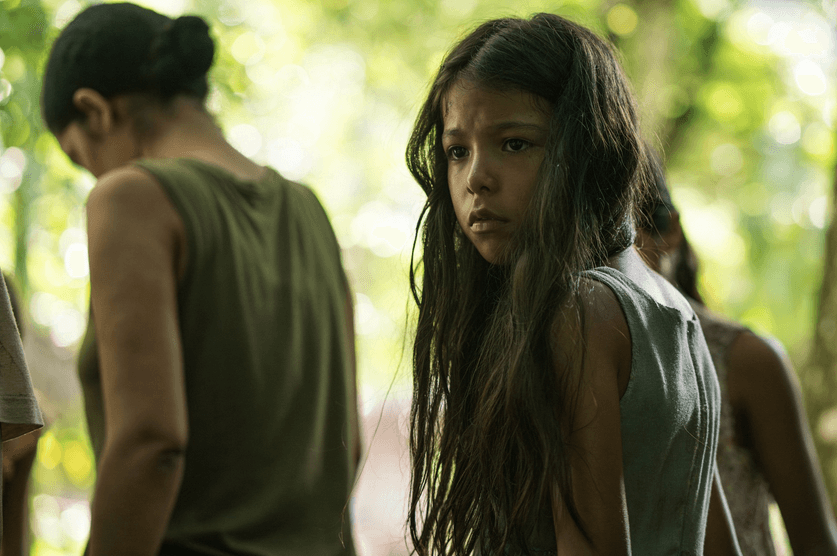 Rocio (Cristal Aparicio, center), a girl sold into sex slavery to a rebel tyrant in the Colombian jungle, in "Sound of Freedom." (Angel Studios)