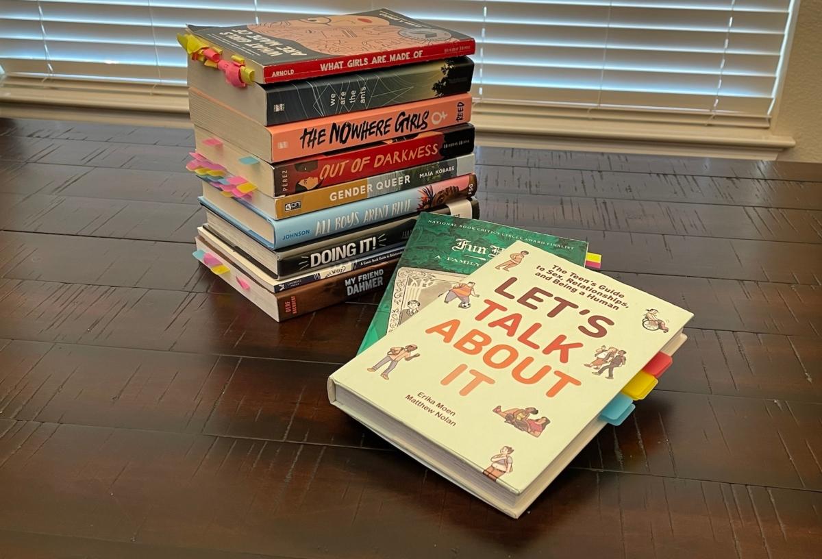 Diana Richards of Texas testified before the state House of Representatives regarding House Bill 900 on March 28, 2023. This is a stack of books containing explicit language and images that have been found in some Texas public school libraries. (Courtesy of Diana Richards)