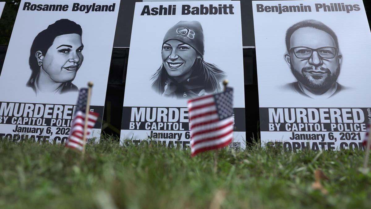 Pictures of Rosanne Boyland, Ashli Babbitt, and Benjamin Philips, three of the four Donald Trump supporters who died on Jan. 6, 2021, are seen during a “January 6th Solidarity Truth Rally” near the U.S. Capitol on Sept. 24, 2022. (Alex Wong/Getty Images)