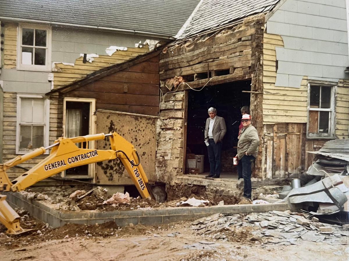 During the historic home's renovation with Mr. Simpson's parents (right) and an unidentified suited individual (left) in 1984. (Courtesy of Ronnie Simpson)