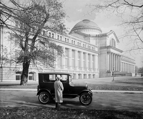 Model T Ford parked in front of the Smithsonian's National Museum in 1926. National Photo Company. Library of Congress. (Public Domain)