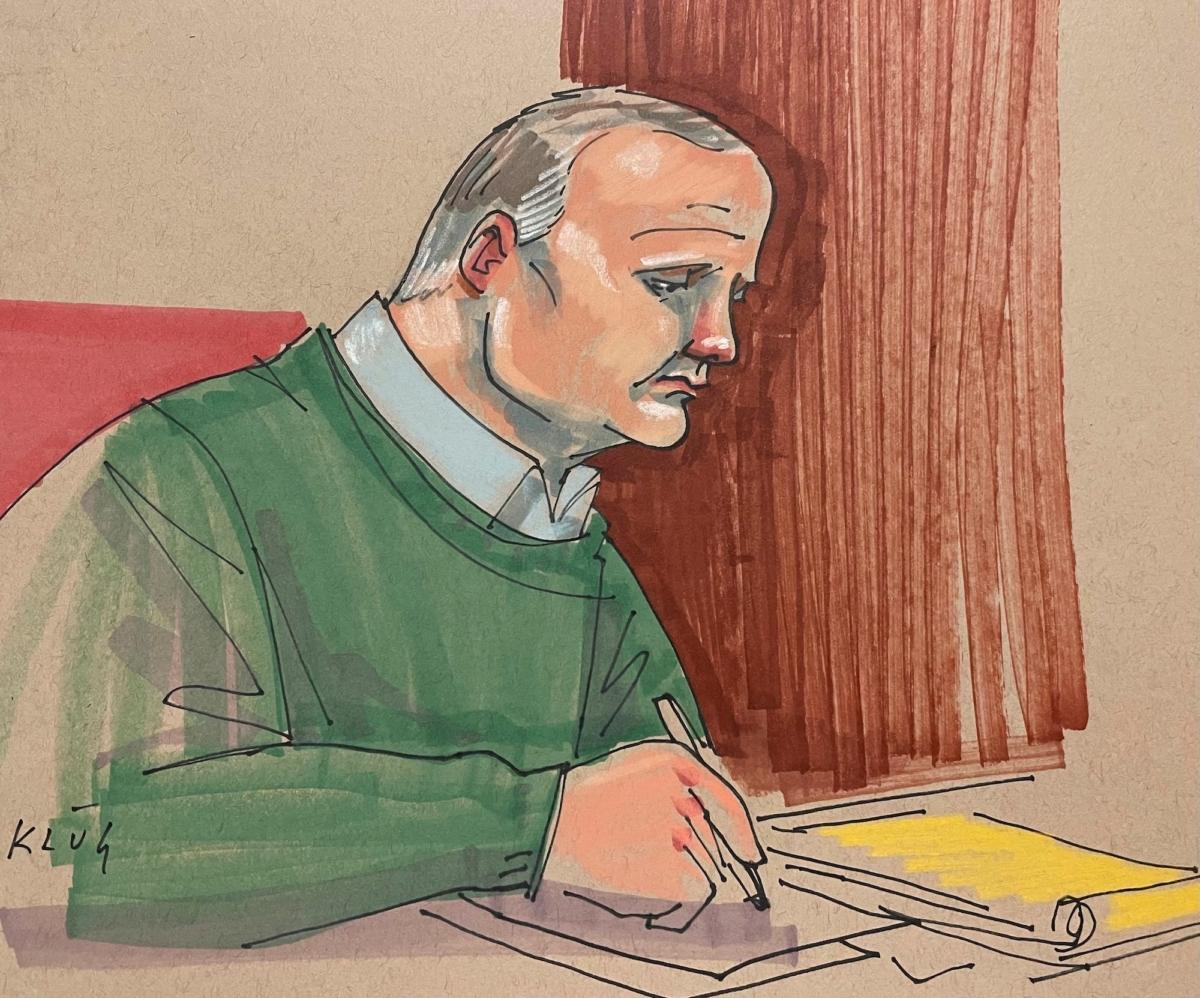 Defendant Robert Bowers takes notes during a sentencing hearing at a federal court in Pittsburgh on July 31, 2023. (Dave Klug via AP)