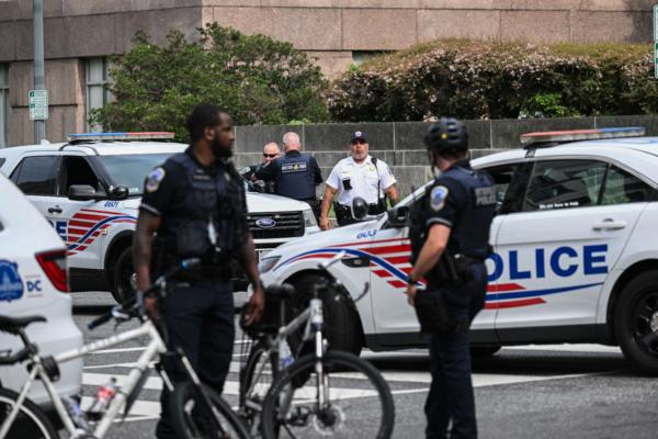 Police officers patrol outside the E. Barrett Prettyman US Courthouse in Washington, DC, on August 3, 2023, ahead of the arraignment of former US President Donald Trump. (Photo by Brendan Smialowski/AFP via Getty Images)