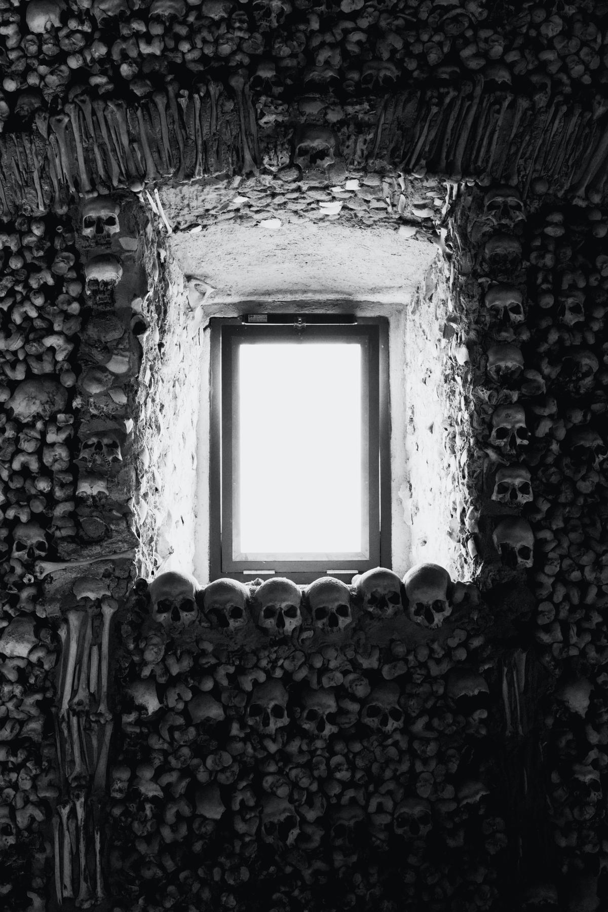 Although sinister in appearance, the Chapel of the Bones was meant for reflection on the transient nature of earthly life. (Miguel Alcantara/Unsplash)