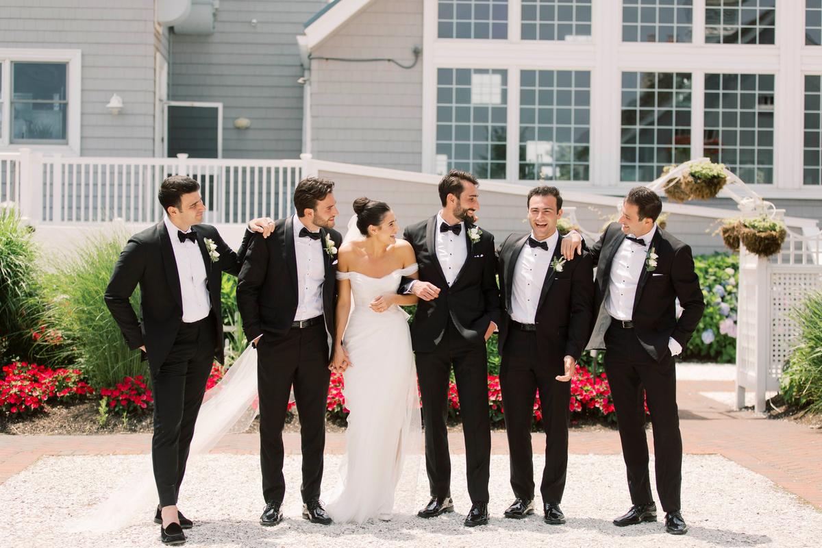 Ms. Bishop with her five brothers on her wedding day. (Courtesy of Brianna Wilbur)