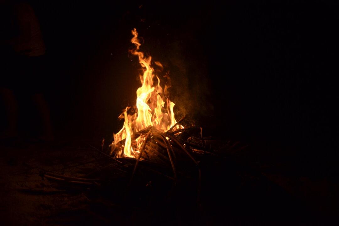 Teenager Charged After Throwing Gas on a Bonfire, Triggering Explosion That Burned 17