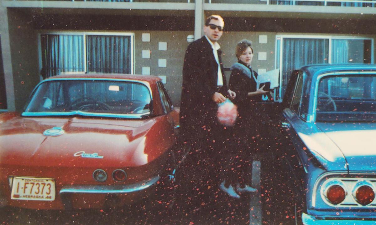 The couple with their four-door family car, a Mercury Comet, and red Corvette. (Courtesy of Brent Farrell)