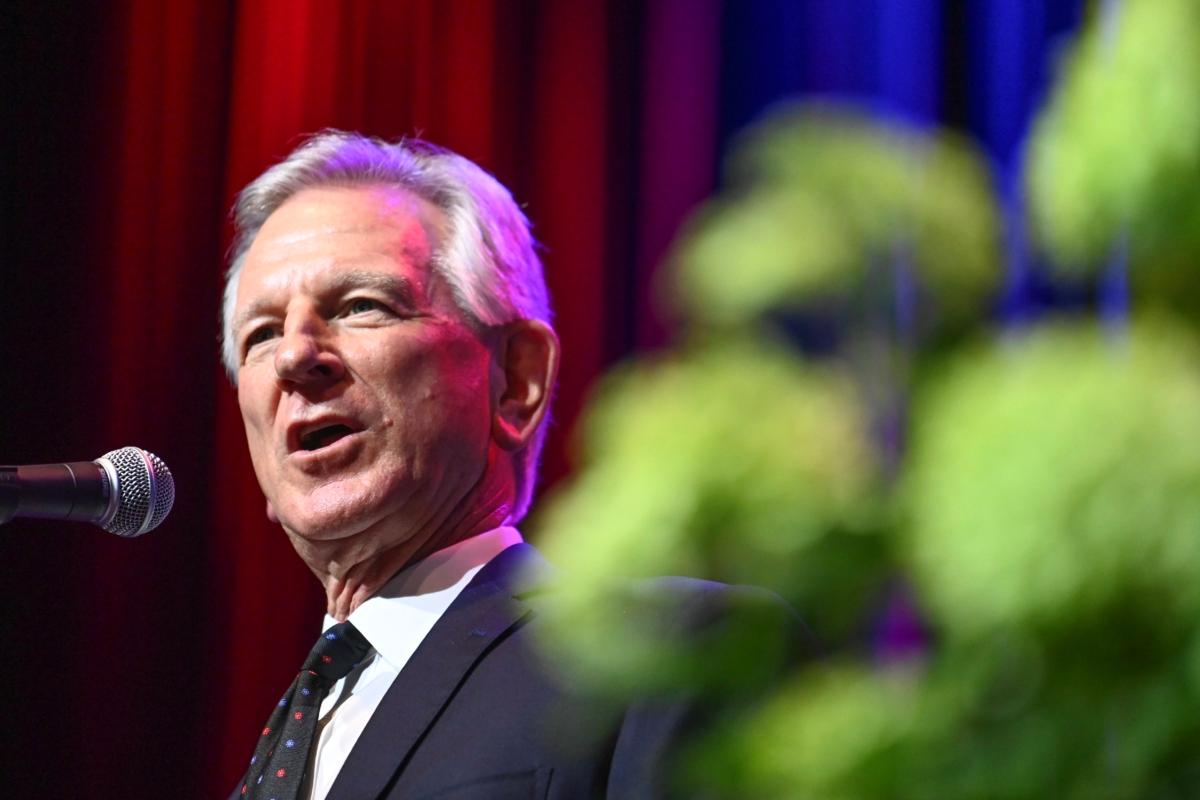 Sen. Tommy Tuberville (R-Ala.) introduces former President Donald Trump to members of the Alabama GOP during their summer meeting in Montgomery, Ala., on Aug. 4, 2023. (Julie Bennett/Getty Images)